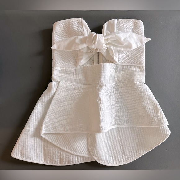 Chelsea Peplum Cutout Strapless Top - Picture 1 of 6